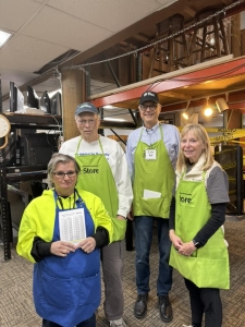 Group photo of four Skagit Habitat Store volunteers